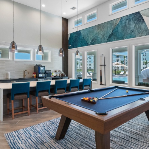 Recreation lounge with billiards shuffleboard and complimentary coffee bar