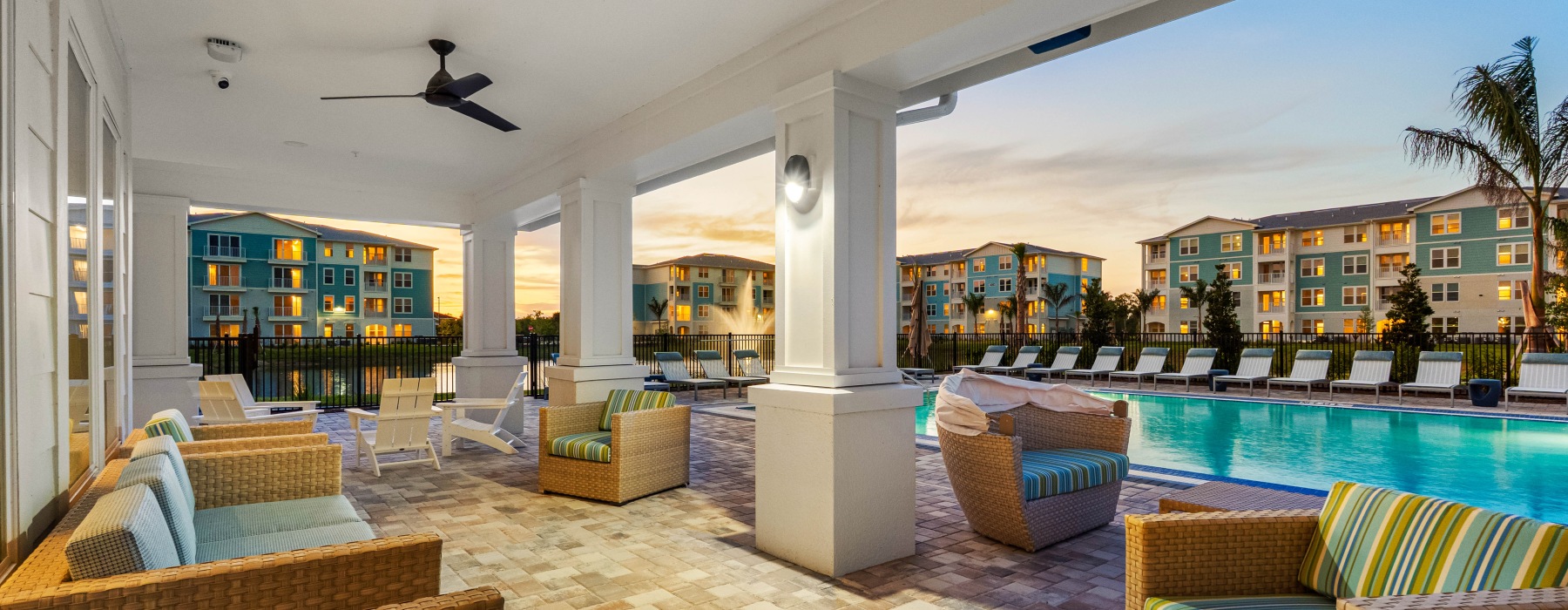 pool deck lounge at sunset