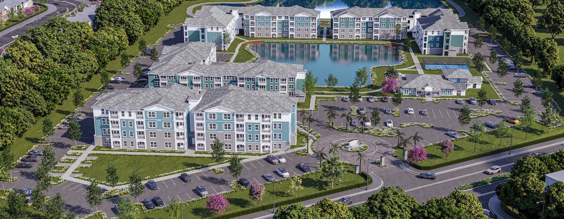 a large building with a pond in front of it